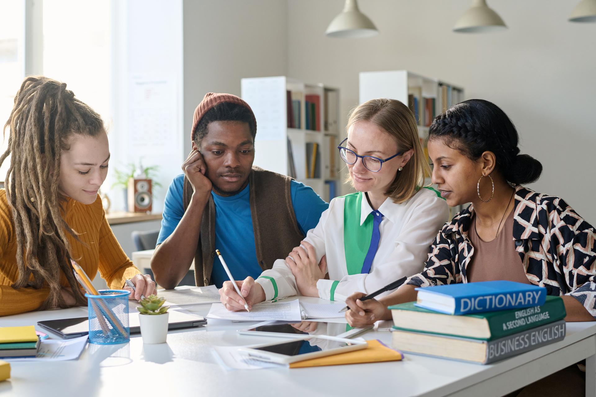 Female Teacher with Group of Students